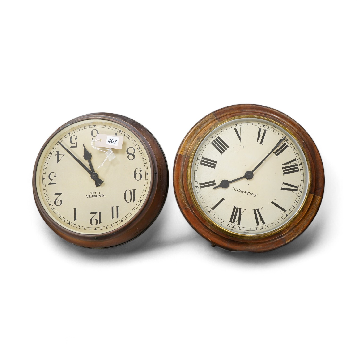 Two electric slave wall clocks comprising Pulsynetic and Magneta, largest 39cm in diameter